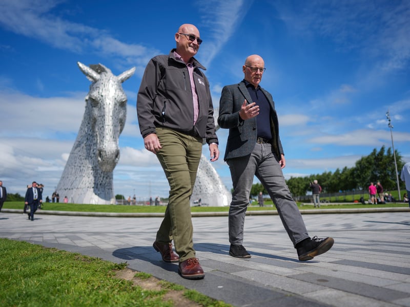 Scottish First Minister and SNP Leader John Swinney is seen with John Paterson, Scottish Canals CEO, prior to announcing his plans for a second independence referendum.