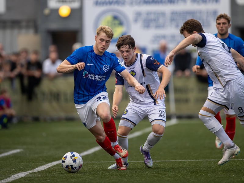 Paddy Lane tries to set up a Pompey attack under pressure