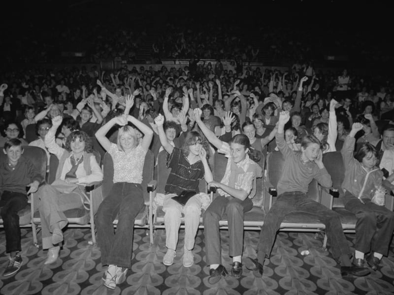 Young people watch Grease, which was one of the biggest films of the 70s, at the cinema in September 1978