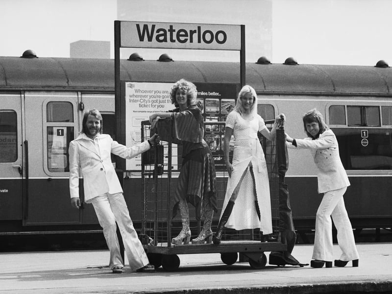 Eurovision winnners ABBA (Benny Andersson, Anni-Frid Lyngstad, Agnetha Faltskog and Bjorn Ulvaeus) pose at Waterloo railway station in 1974
