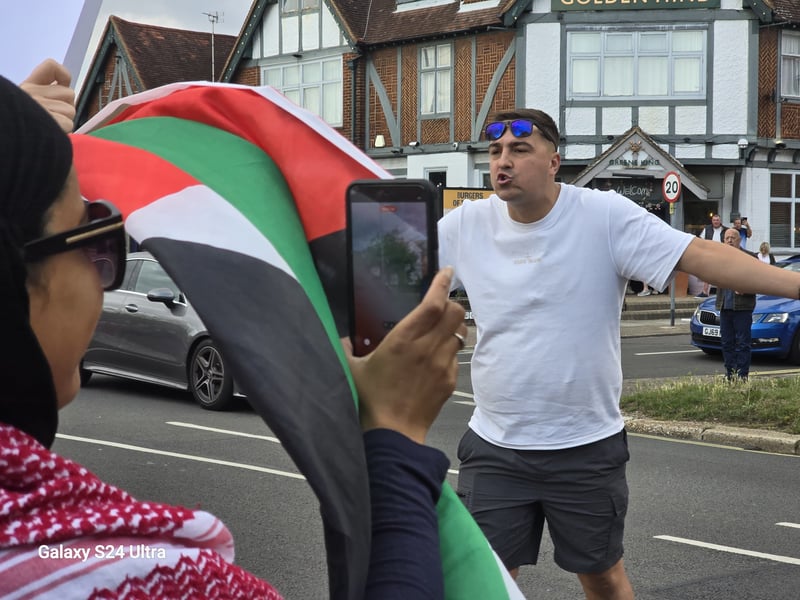 One man confronts the protestors.