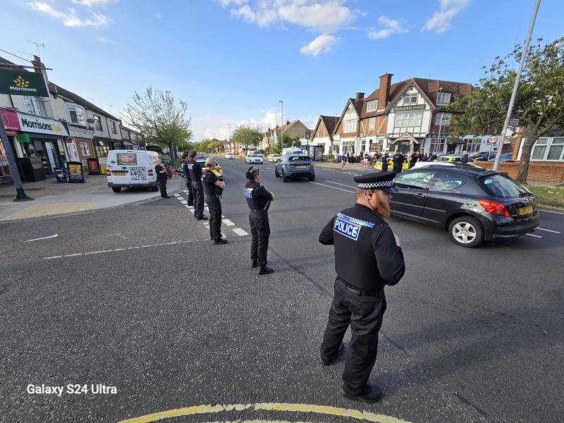 Around eight police cars attended the scene to separate the groups.