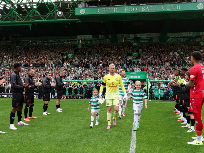 Celtic players are given a guard of honour by St Mirren as they enter the field.