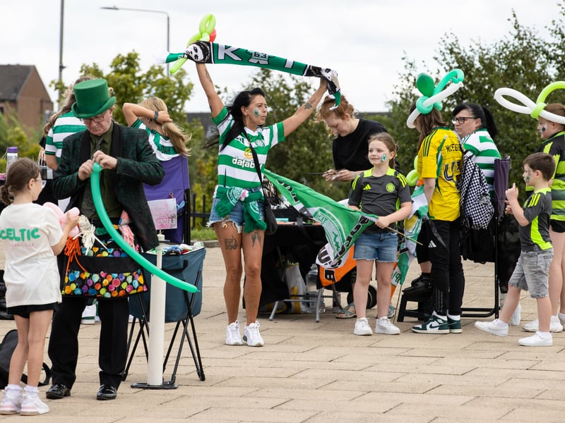 Celtic fans enjoy the pre-game festivities outside of the ground.