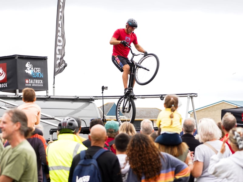 Andrei Burton doing bike tricks at the Beach Dubbin festival on Southsea Common in Portsmouth. 

Pictured: Andrei Burton. 

Picture: Alec Chapman