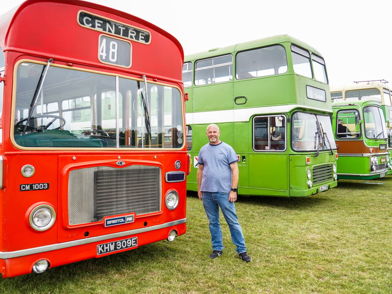 Mike Elkin stood in front his buses at Stokes Bay Bus Rally in Stokes Bay, Gosport.

Pictured: Mike Elkin. 

Picture: Alec Chapman