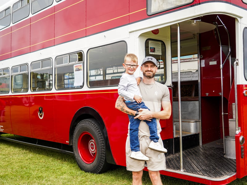 Fraser Smith and his son, Kaylan Smith, at Stokes Bay Bus Rally in Stokes Bay, Gosport. 

Pictured: Alec Chapman