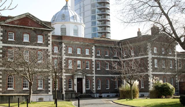 One of the oldest structures at Portsmouth Naval Base, this building is a Georgian forerunner of the Britannia Royal Naval College at Dartmouth. It has long been vacant, with its natural ventilation and background heating being introduced and furnishings removed to reduce damp levels. Remedial works to roof coverings and parapet gutters have reduced water ingress and the dry rot appears to be dying back. The cupola has been repainted. Asbestos has been found in the roof and must be removed before full surveys can be undertaken. The Grade II* listed building has been given a priority C grade and is described as being in "poor condition".