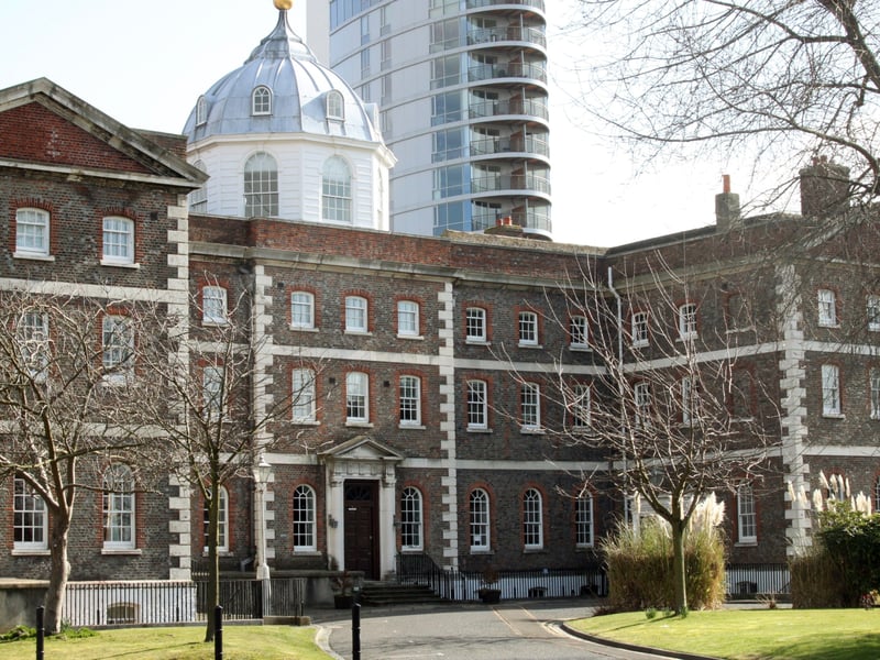 One of the oldest structures at Portsmouth Naval Base, this building is a Georgian forerunner of the Britannia Royal Naval College at Dartmouth. It has long been vacant, with its natural ventilation and background heating being introduced and furnishings removed to reduce damp levels. Remedial works to roof coverings and parapet gutters have reduced water ingress and the dry rot appears to be dying back. The cupola has been repainted. Asbestos has been found in the roof and must be removed before full surveys can be undertaken. The Grade II* listed building has been given a priority C grade and is described as being in "poor condition".