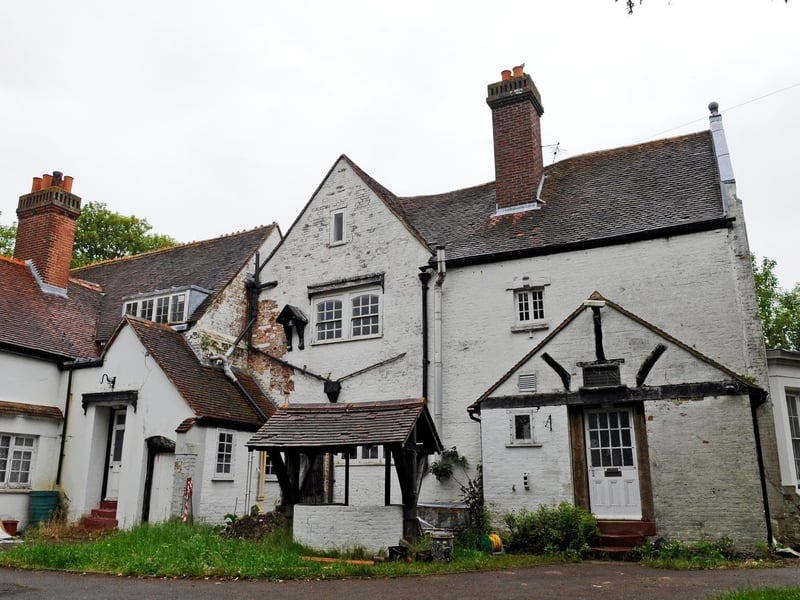 Manor house, with medieval fabric and later work, is said to be one of Hampshire's most haunted buildings. Acquired by a Trust in 2013, the house is in need of structural repairs and beetle treatment to address deterioration. The Trust is revisiting an options appraisal funded by the Architectural Heritage Fund, and is considering sustainable creative uses in support of income generation and local needs. Historic England continues to offer early stage project support. A detailed condition survey and structural report is urgently required to identify repair solutions and the costs involved. It has been given a priority C grade and is in "poor condition".