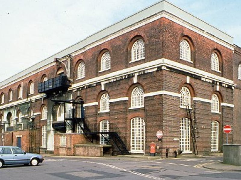 The Iron foundry and smithery, built 1857-1861 by Col GT Greene RE and Andrew Murray, Chief Engineer, was extended in 1878 with later alterations. The main part of the building was converted to office use in 2003. The east wing (Building 1/136) remains unused and at risk. There were concerns over drainage and regular flooding of the building but this has been resolved. Roof repairs are due to be undertaken. It has been given a priority C Grade, and is suffering from “slow decay”. It is a - Grade II* listed building and is described as being in a fair condition.