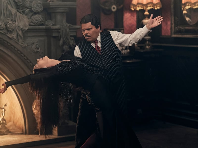 Luis Guzmán returns once again as the patriarch of the Addams family - Gomez. He was in the Netflix film Havoc earlier this year as well.