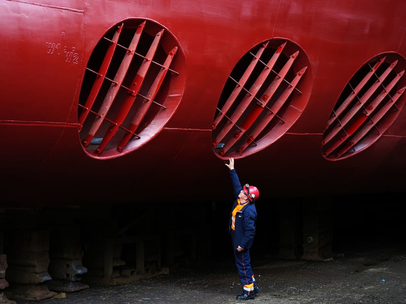 Fabrication quality inspector David Watt alongside the forward thrusters at the bow of the Glen Rosa at Dales Marine, Greenock. Picture: Jane Barlow/PA Wire