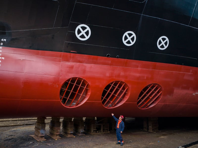 Fabrication quality inspector David Watt alongside the forward thrusters at the bow of the Glen Rosa at Dales Marine, Greenock. The ferry has been in dry dock to complete the next important steps in the building process. Picture: Jane Barlow/PA Wire