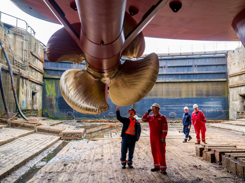 The propellant shafts at the stern of the Glen Rosa are inspected at Dales Marine, Greenock. The Glen Rosa's hull is getting its fresh coat of paint and the propellers and drive shaft being polished to a high shine. Picture: Jane Barlow/PA Wire 