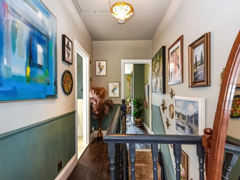 The listing says: "The home has been thoughtfully designed, featuring restored period details and custom-made plantation shutters that enhance its character."
