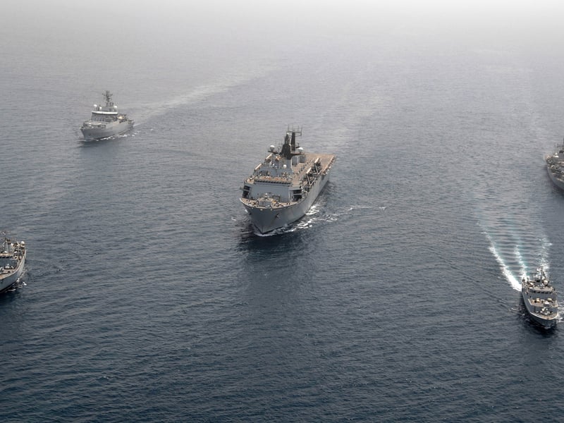 Photographic Exercise of Royal Navy Ships in the Gulf along with United Arab Emirates Landing Craft. This was taken during the Sea Khanjar Exercise where 40 Commando Royal Marines worked alongside of the United Arab Emirates Presidential Guard Marines in a variety of Beach Assaults. Ships that took part in the Photographic Exercise are, HMS Albion (centre), HMS Sutherland (back righ), HMS Echo (back left), HMS Pembroke (bottom left), HMS Middleton (bottom right) and a UAE Landing Craft to the far front. The screen was organised by Leading Seaman Geldard from HMS Albion.