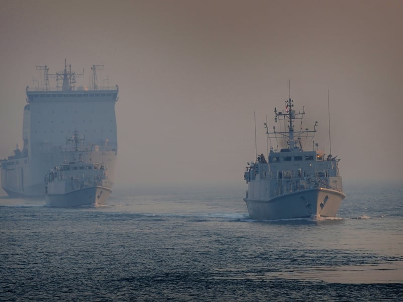 HMS Pembroke leading HMS Ramsey and RFA Lyme Bay in to line behind HMS St Albans during the Officer Of the Watch Manoeuvres in the Middle East.