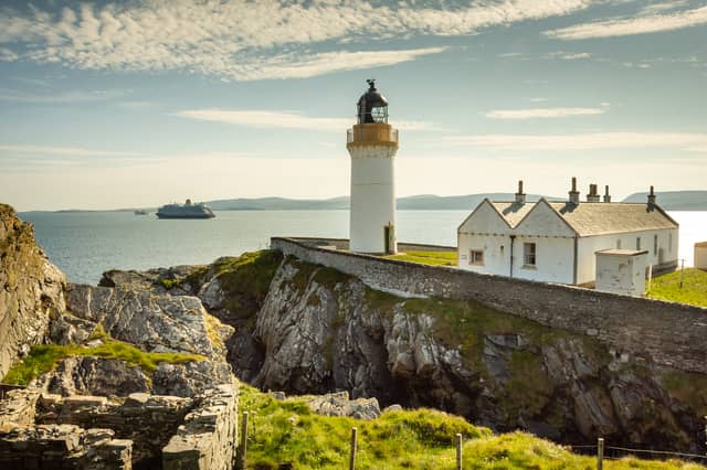 The lighthouse is located at Kirkabister Ness, on the southwestern tip of the island of Bressay, in Shetland