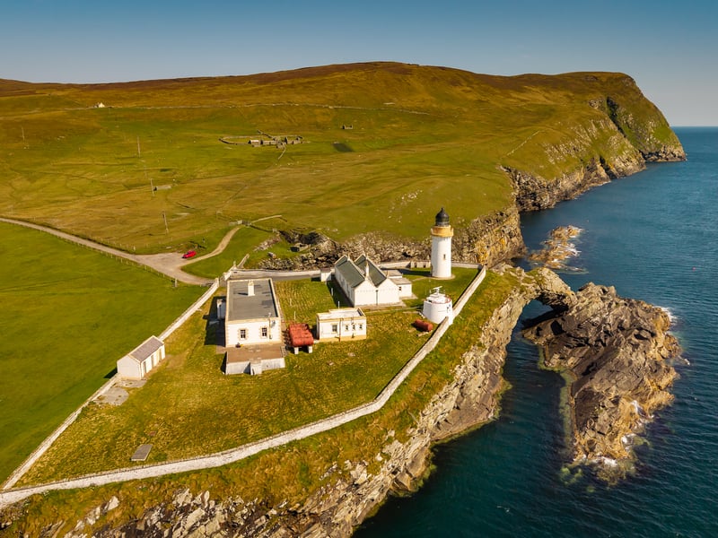 The complex comprises the original lighthouse tower, two former keepers' cottages, a former engine room, and an artist's residence and studio