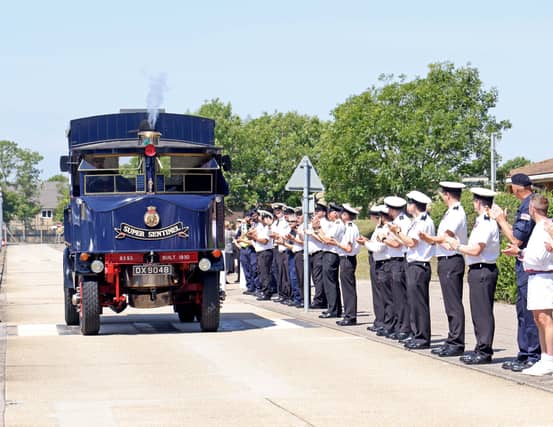 Capt John Voyce OBE RN departing HMS Sultan on the base's historic steam lorry on June 15, 2022. The vehicle is celebrating its 95th anniversary.