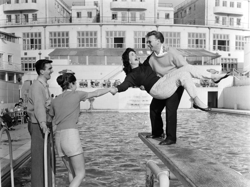 Honeymooning couples by the pool at Billy Butlin's Ocean Hotel in Saltdean near Brighton, Sussex, in April 1957