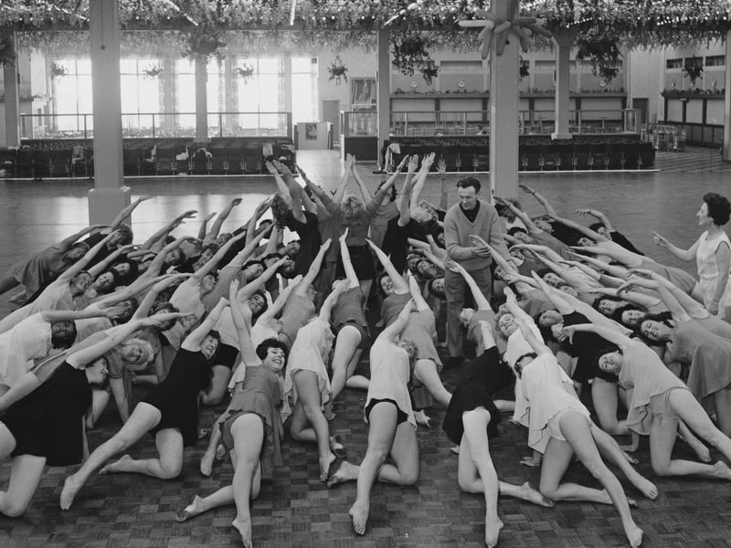 Ronald Stanway leads a fitness class at Butlin's holiday camp in Clacton-on-Sea, Essex, in October 1963