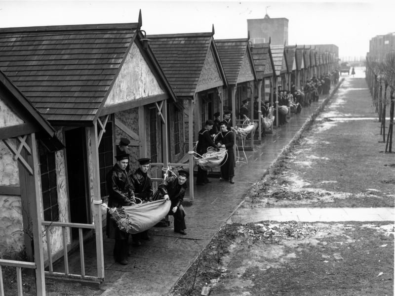 Navy recruits sling hammocks at HMS Arthur, formerly Butlin's Holiday Camp, Skegness, Lincolnshire, in February 1940