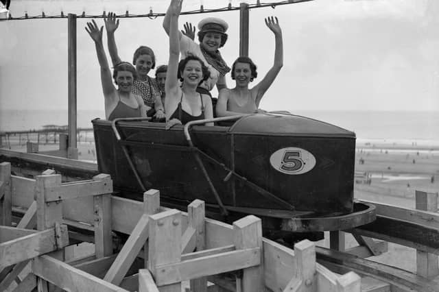 Holidaymakers on a fairground ride at Butlin's in Skegness in June 1936