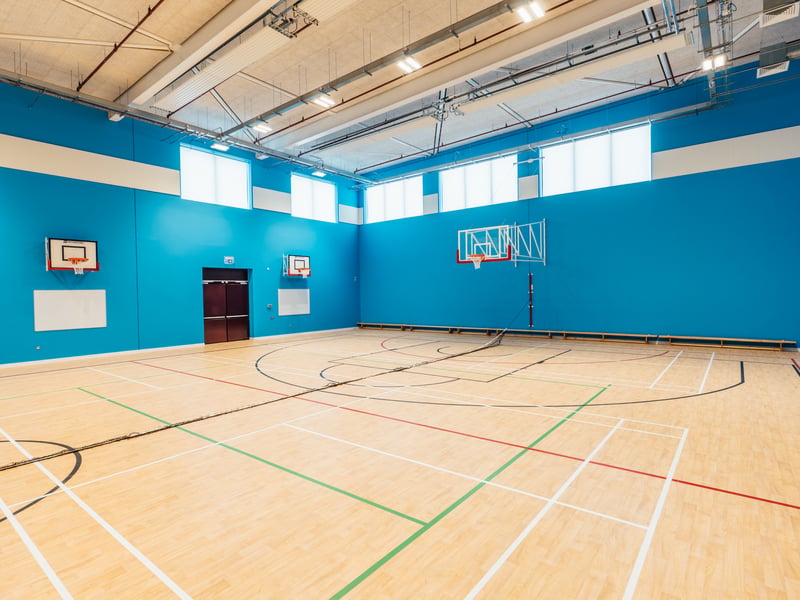 The school includes a four-court sports hall, a gym hall, a fitness Suite, a dance studio, a Passivhaus four lane swimming pool and a 3G pitch.