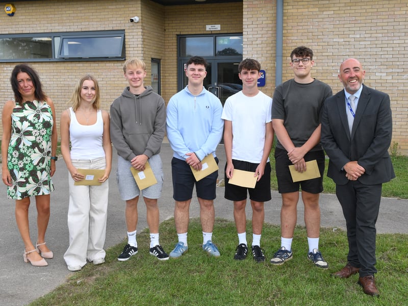 A-Level results at King's Academy Bay House School in Gosport. 

Pictured: (Left to right) Stacey Osborne Head of Sixth Form, Charlotte Bunting, Charlie McLaughlin, Billy Baines, Alex Thomas, Adam Durham, Chris Willis Headteacher

Picture: Paul Jacobs/pictureexclusive.com