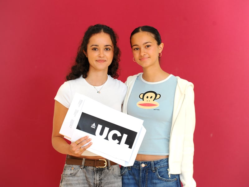 Students from Portsmouth High School in Southsea, collected their A Level results.

Pictured is: (left) Anusha Davies (17) who got three A's in Chemistry, Biology and Maths and is off to UCL to study medicine, with her sister Priya Davies (15).

Picture: Sarah Standing (140825-2955)