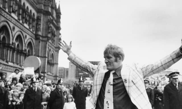 Boxer Richard Dunn is given a hero's welcome in Bradford in May 1976, despite losing to Muhammad Ali in the World Heavyweight title clash. The huge underdog put in a gutsy performance against the all-time great, hitting the canvas five times before being counted out in the fifth round. He was the last man Ali stopped in the ring.