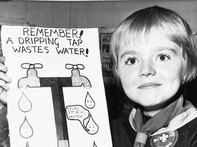 Wakefield schoolboy Andrew Bigos shows off his prizewinning poster encouraging people to save water during the drought of 1976