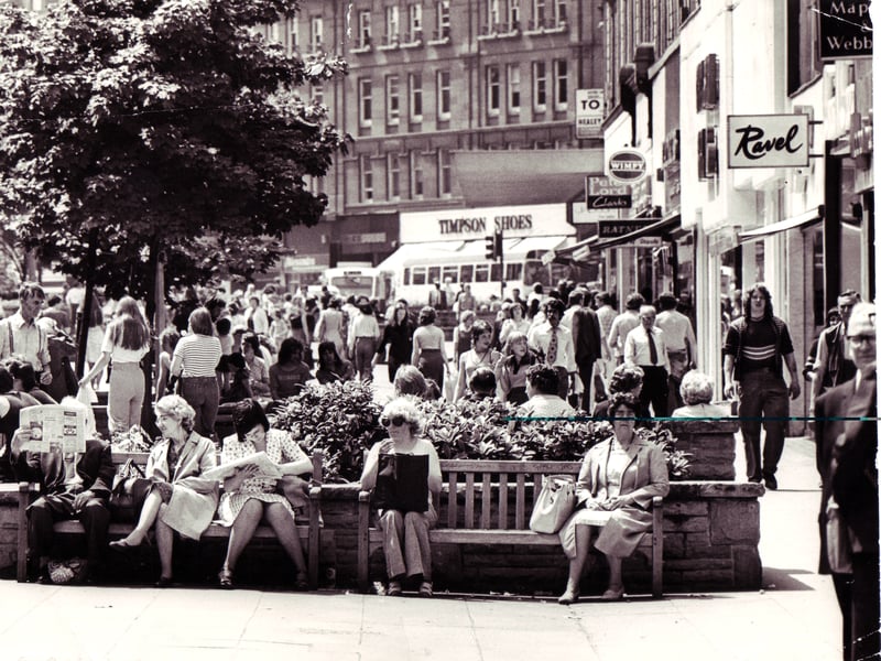 Shoppers relax in the sun in Sheffield city centre during the long, hot summer of 1976
