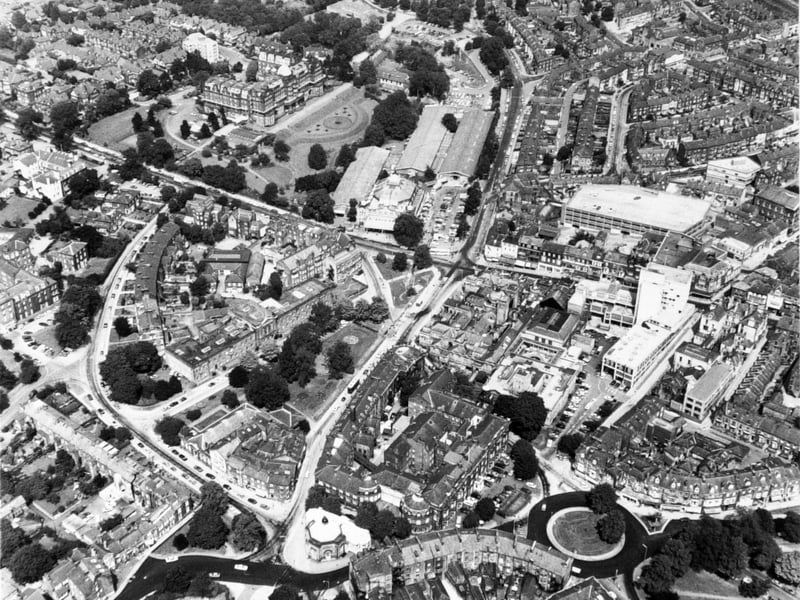 An aerial view of Harrogate in July 1976, showing the Majestic Hotel, the Royal Hall and Exhibition Halls, and the entrance to the Valley Gardens