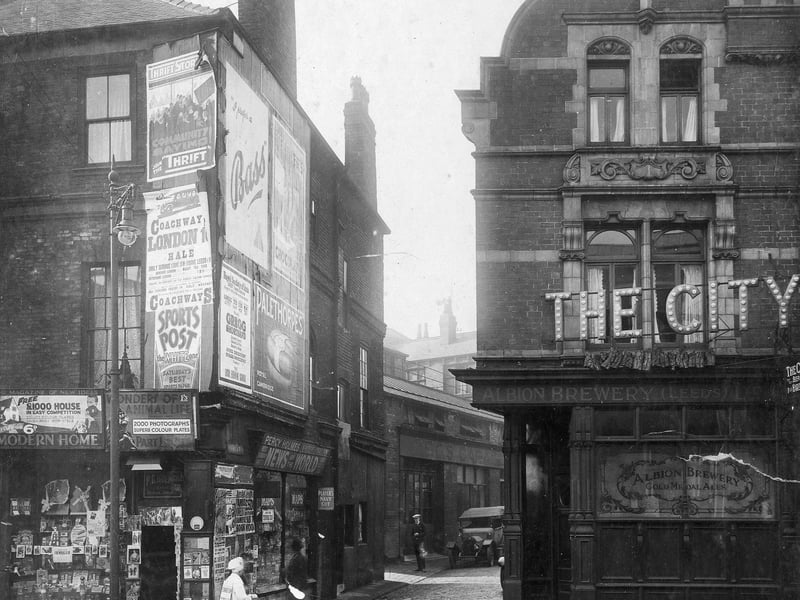 Wormald Row and Woodhouse Lane in October 1929. Newsagents shop on left is no.15 Woodhouse Lane, business of Percy Charles Holmes. To the right is 'The City' public house, beer from Albion Brewery, Leeds. The landlord was Harold Buck.