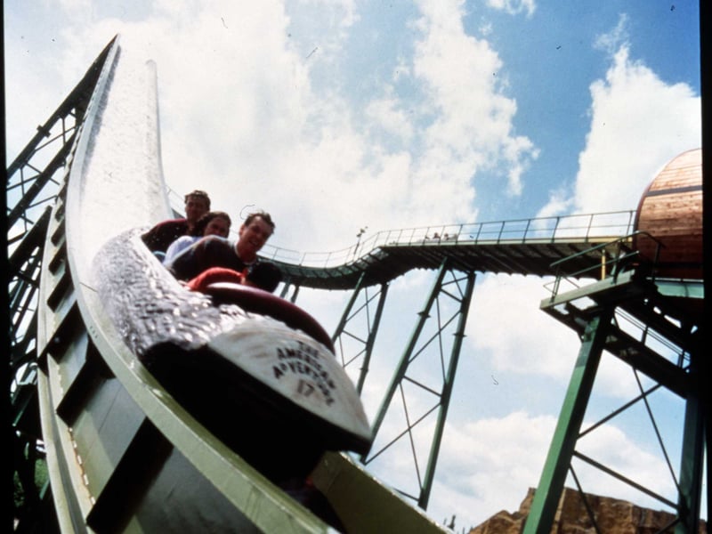 Riding the Cherokee Falls log flume at the old American Adventure theme park in Derbyshire