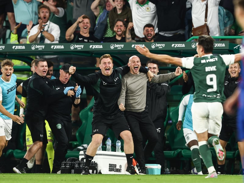 Bowie celebrates his goal of the season contender with the Hibs boss.