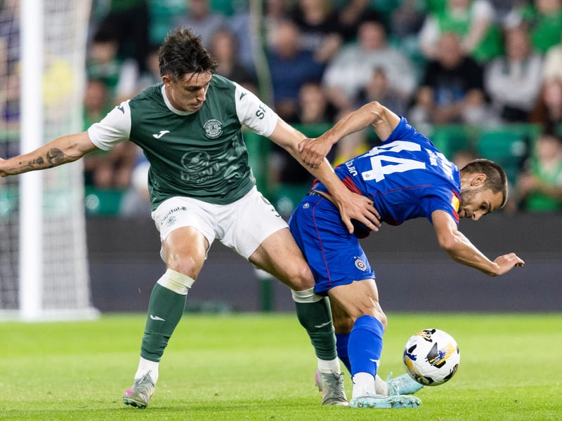 Kieron Bowie and Stefan Milic challenge for the ball as the second half starts.
