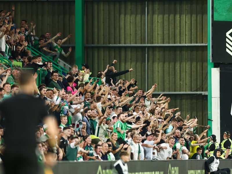 After being put through the ringer, the home fans celebrate as the referee blows the full time whistle.