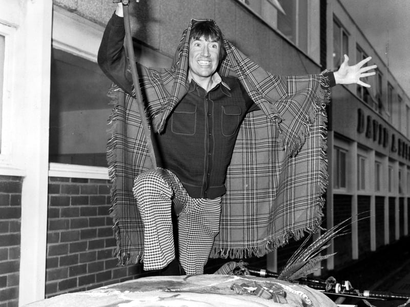 Roy Castle, presenter of the Record Breakers TV programme,  prepares to cut the record-breaking haggis (328 lbs) which took 11 hours to prepare at David A Hall's factory in Broxburn, in January 1978. Portions of the haggis were distributed to 20 old folks' homes in time for their own Burns celebrations.