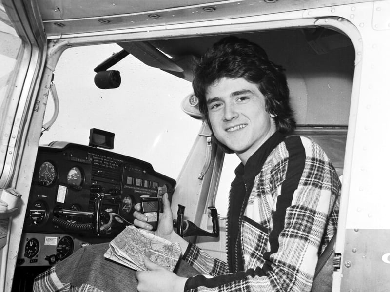 Les McKeown of the Bay City Rollers takes flying lessons at Turnhouse Airport in April 1975