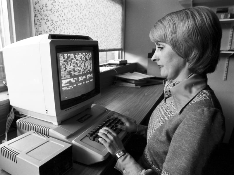 A woman uses the new Apple II computer at the Royal Infirmary Glasgow in May 1979