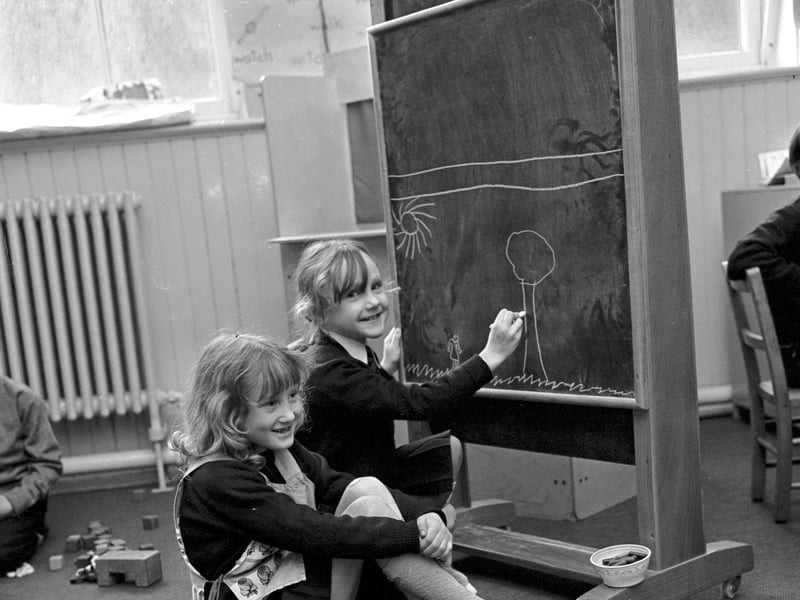 Children drawing on the blackboard at Burntisland Primary School, in Fife, in March 1974