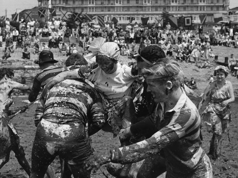 A mud football match at Southend-on-Sea in 1962
