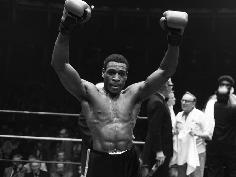 Heavyweight boxer Frank Bruno pictured celebrating in the ring in December 1983