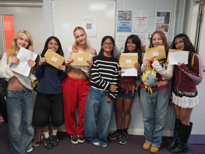 Oaklands Catholic School and Sixth Form College has said it is 'delighted' with the outcome of today's GCSE results with 87 per cent of students achieving a grade 4 or above in English and 72 per cent in maths. 

Pictured: Students with their results