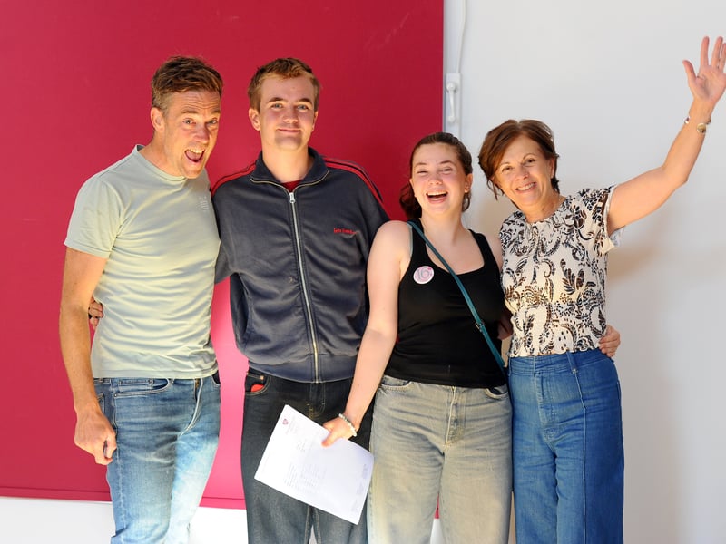 Students from Portsmouth High School in Kent Road, Southsea, collected their GCSE results. 

Pictured is: Holly who celebrated her 16th birthday on the day she collected her GCSE results with her dad Gavin, brother Jack and mum Claire.

Picture: Sarah Standing (210825-3043)