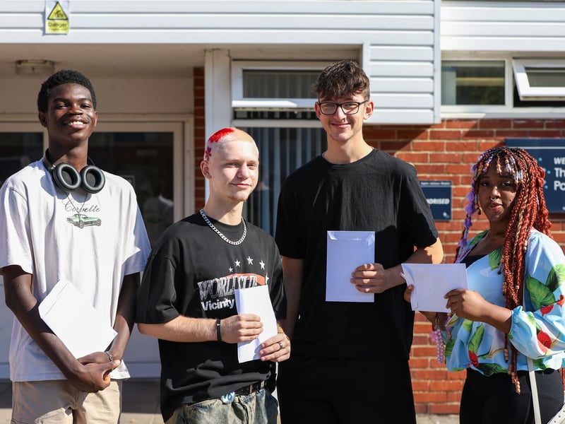 GCSE results at Portsmouth Academy, St Mary's Road. 

Pictured: From left, Fiyin, Sonny, Archi and Clinton. Clinton hopes to go to university 'but it's one step at a time with A-levels first.'

Picture: Chris Moorhouse 